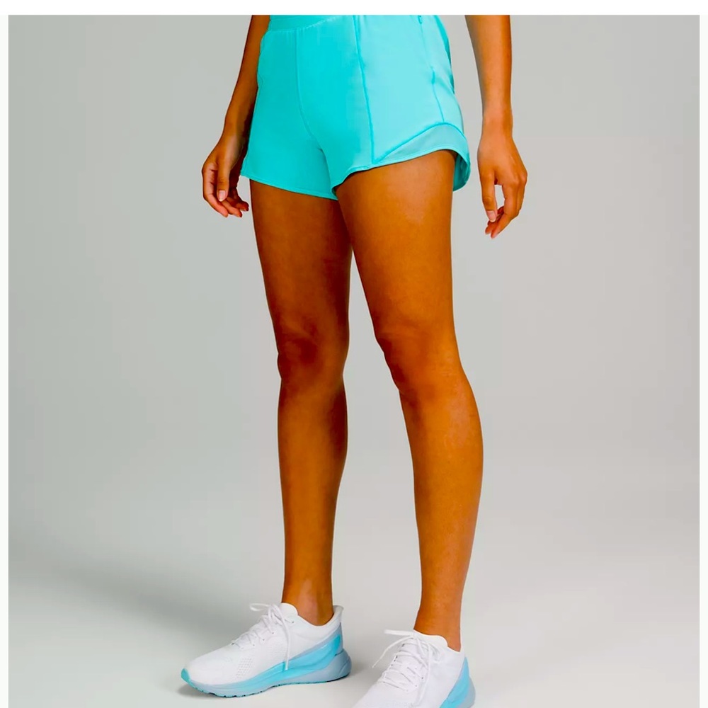 Lululemon size 6 4” electric Turquoise hotty hot